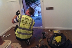 New door lock being fitted